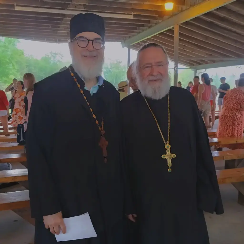 Father Gregory and another priest pose while overseeing a Russian Orthodox youth camp.