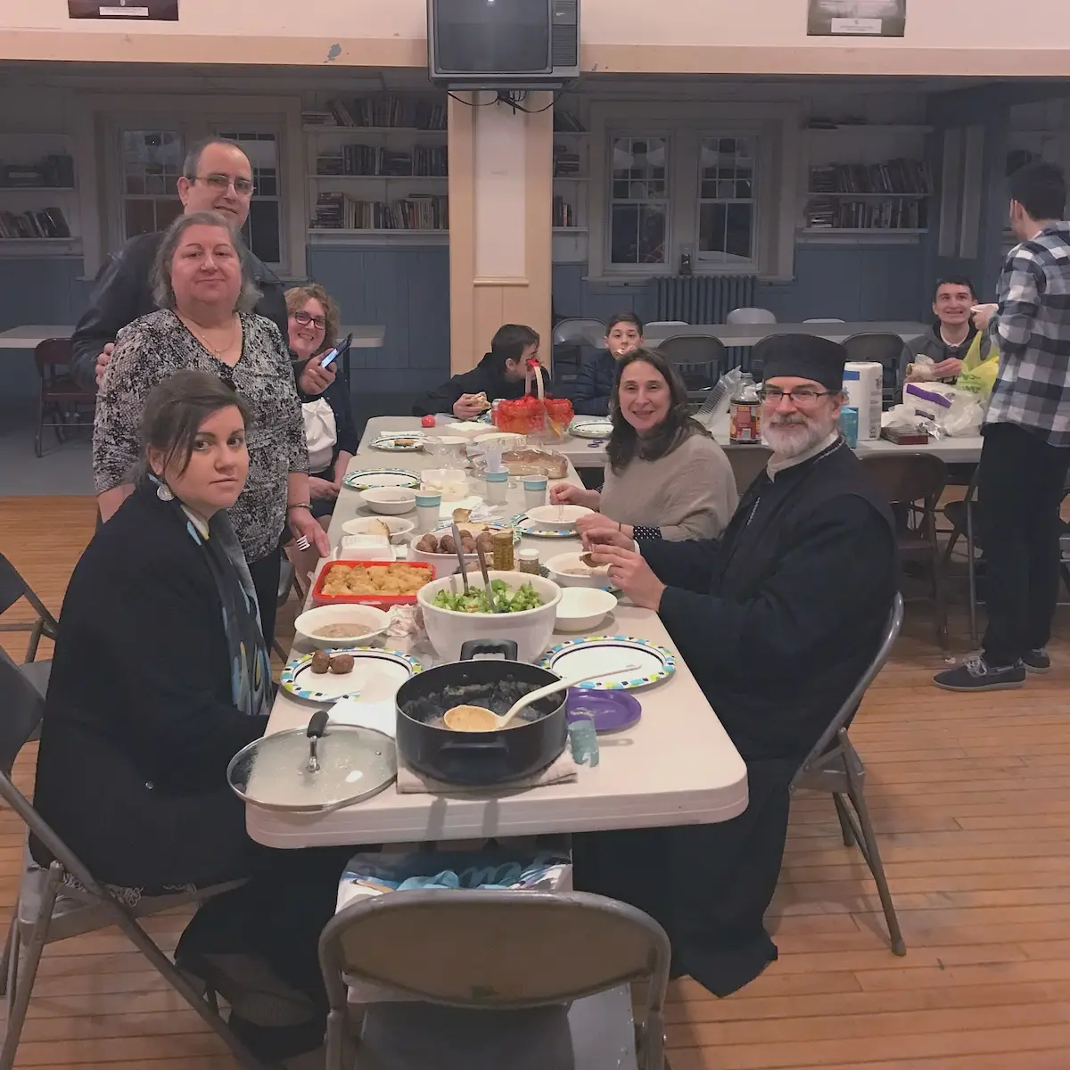 After a service, parishioners gather and smile.